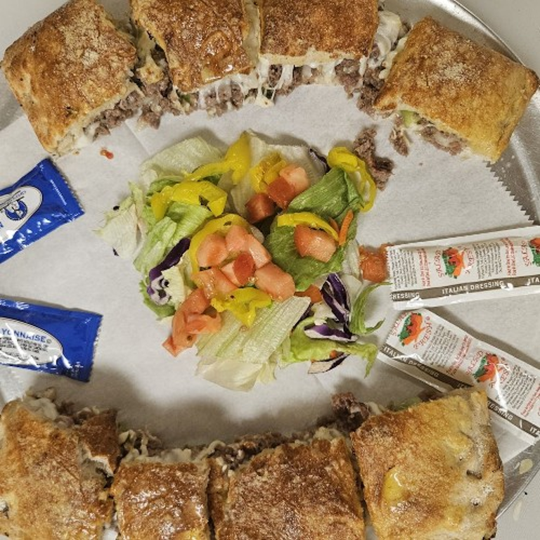 Fresh Greek Salad and More at Our Pizzeria